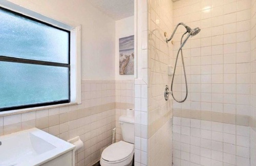 Leisureville Cottage | Luxury 1 Bedroom Cottage with Resort Style Heated Pool In Tropical Paradise!