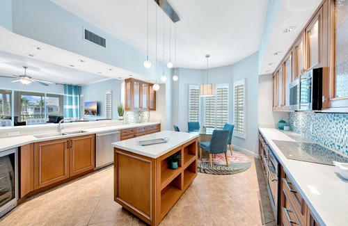 Vanderbilt Beach Condo | Luxury 3,000 sq. ft. coastal home w/private club access. Walk to the beach.