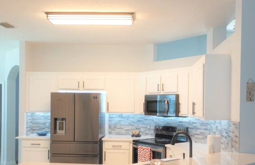 Florida Pines House | Luxury 4 Bedroom Home/South facing Pool/Spa/Covered Lanai. Champions Gate Area
