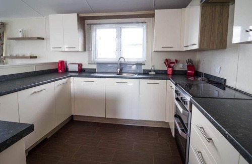 Hunstanton House | Luxury 6 berth lodge with decking at Manor Park in Hunstanton ref 23205K