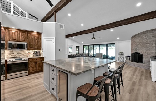 Willis House | Luxury 6BR Lakefront Home with Pool, Private Dock, Game Room, Putting Green & Outdoor Oasis!