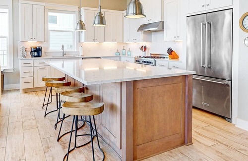 Rockport House | Luxury bayfront home with plunge pool, outdoor kitchen, docks, kayaks & SUPs