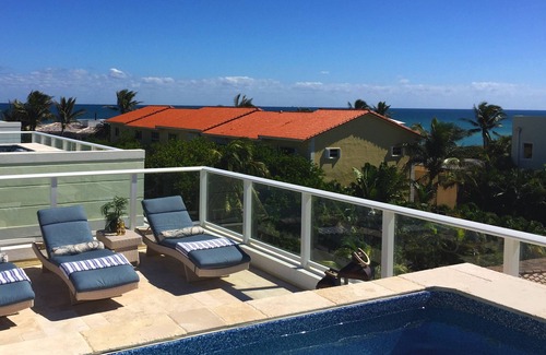 North Beach House | Luxury Beach Villa with Private Rooftop Pool & Elevator, Steps to Tranquil Beach