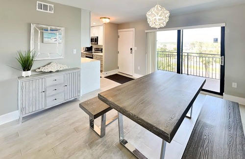 Crescent Beach Condo | Luxury Condo with Balcony, Ocean View, Pool and Just Steps to the Beach