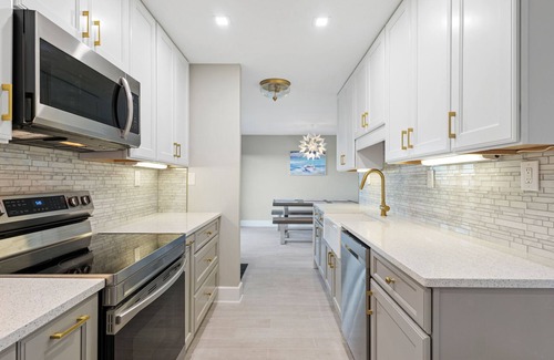 Crescent Beach Condo | Luxury Condo with Balcony, Ocean View, Pool and Just Steps to the Beach
