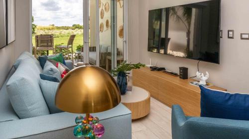 Bavaro Apartment | Luxury Condo with Golf Cart Included in Cana Pearl