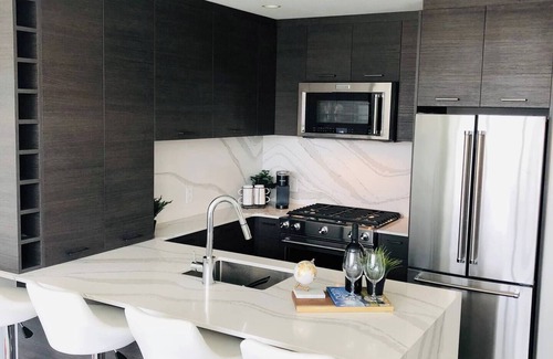 Cultural District Condo | Luxury condo with pool! Steps to beach/downtown!