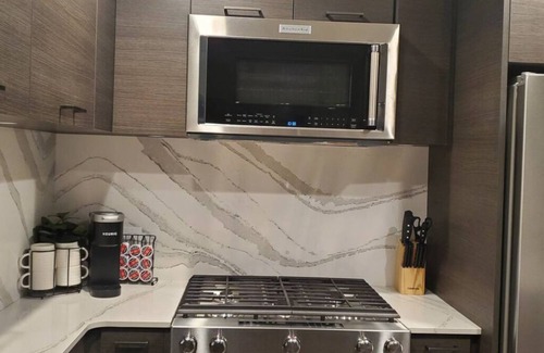 Cultural District Condo | Luxury condo with pool! Steps to beach/downtown!