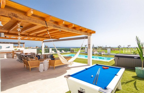 Costa de Antigua Villa | Luxury Family Villa, Jacuzzi, Oceanfront, Heated Pool, Playground, A/C