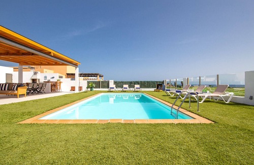 Costa de Antigua Villa | Luxury Family Villa, Jacuzzi, Oceanfront, Heated Pool, Playground, A/C