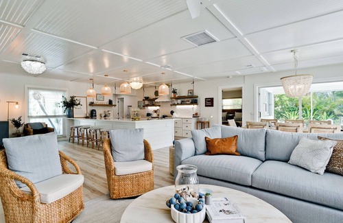 Holmes Beach House | Luxury ground, pet friendly - king suites, heated pool & hot tub - canal!