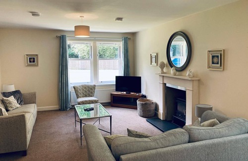 Carberry House | Luxury lodge, set in 40 acres of beautiful private gardens at Carberry Tower Estate.
