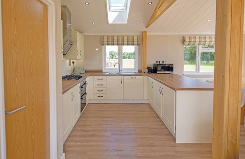 Diss Ski Chalet | Luxury lodge with one double with en suite shower and one twin.
