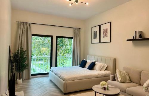Discovery Gardens Apartment | Luxury Modern Studio I Discovery Gardens