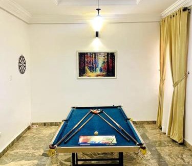 Abuja Apartment | Luxury Oasis 1 - Private En-suite 1 Bedroom in a Shared Apartment in Abuja with Pool, Games, Balcony, and Garden