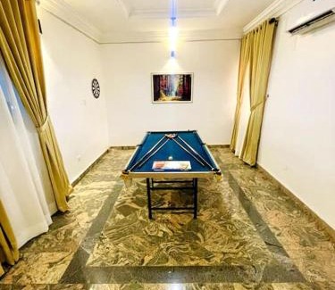 Abuja Apartment | Luxury Oasis 1 - Private En-suite 1 Bedroom in a Shared Apartment in Abuja with Pool, Games, Balcony, and Garden