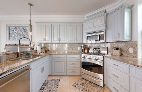 Saint Simons Island Villa | Luxury Oceanfront Villa with pool, firepit, & rooftop view-Walk to Pier Village!