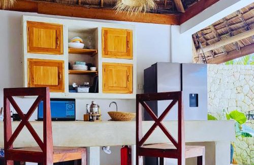 Paje Villa | Luxury Penthouse with private rooftop pool prime location Paje Beach Zanzibar TV WIFI AC steps to the beach