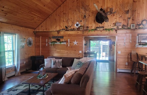 Abbot Cabin | Luxury Riverside Lodging cozy comfort in Abbot Maine 15 mins to Moosehead Lake