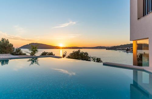 Rogoznica Villa | Luxury Seafront Villa Roots with private, heated pool, 5 en-suite bedrooms, enchanting sea views