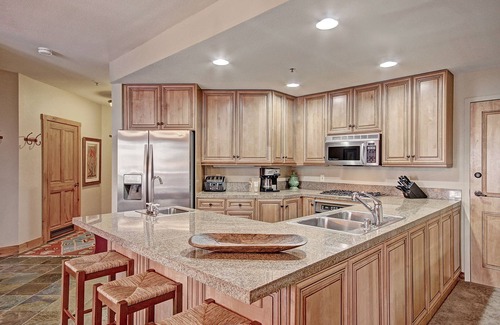 River Run Condo | Luxury Ski in Ski out Condo/Pool and Hot Tub Access/Private BBQ