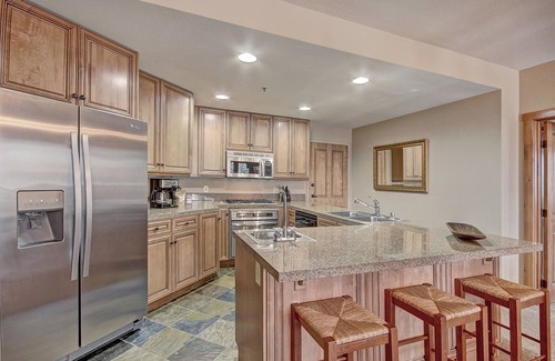 River Run Condo | Luxury Ski in Ski out Condo/Pool and Hot Tub Access/Private BBQ