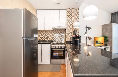 Jumeirah Village Triangle Apartment | Luxury StayCation - Al Jawhara Tower Studio Apt in the Heart of Dubai