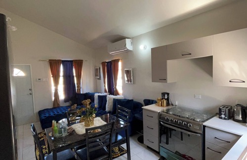 Portmore House | Luxury Versace-Inspired Stay in Portmore – Stylish & Comfortable 2 Bedrooms