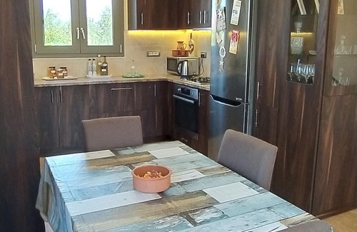 Melidoni Villa | LUXURY VILLA KASTANIA WITH PRIVATE POOL SURROUNDED BY TREES, FLOWERS AND HERBS.