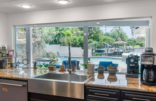 McGregor House | Luxury Waterfront Home w Pool HotTub and Waterslide. Off McGregor near Beaches
