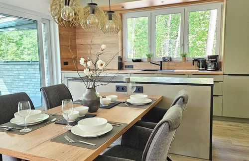 Lychen House | Lychensee villa with lake view, conservatory, fireplace and sauna