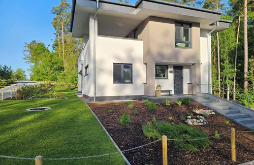 Lychen House | Lychensee villa with lake view, conservatory, fireplace and sauna