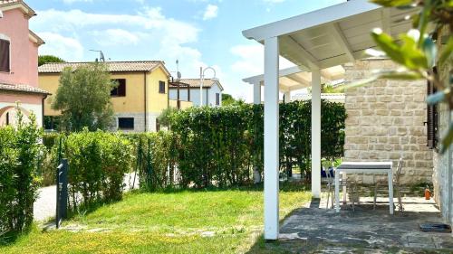 Numana Apartment | M375 - Marcelli, bilocale con giardino in residence con piscina