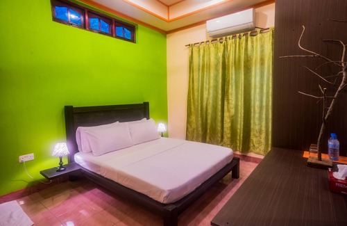 Maalhos House | Maclura Residence guest house at Baa Maalhos, with four bedrooms