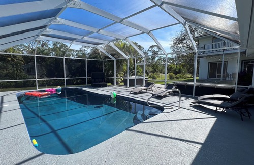 Naples House | Magical Naples Retreat – 5BR, Pool, Hot Tub & More!