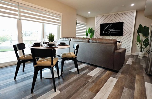 Southeast Calgary Condo | Mahogany Lakefront 2BR Walkout | Trails & Privacy