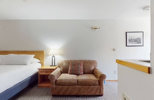 West End Cabin | Main St. gem - pool & hot tub - walk to lifts, dog-friendly, private balcony