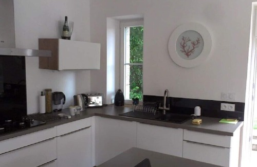 La Vicomte-sur-Rance House | Maison Rose is in a lovely position in a quiet village on the River Rance, overlooking the marina