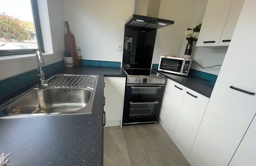 Whitianga House | Make Memories at Cook Drive. Space to play and park the boat. Centrally located.