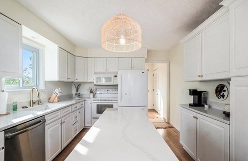 Gaylord House | Marvelous updated 4-bedroom lake house in Gaylord with sunset views and a beach