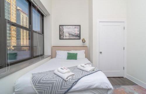 Near South Side Apartment | McCormick Place 3BR Luxury Penthouse Duplex with Personal Rooftop and Optional Parking for 8 guests in Chicago South Loop