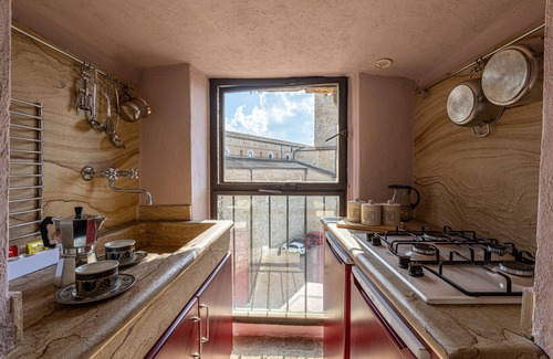 San Gimignano City Centre Apartment | Medieval tower experience with private rooftop, San Gimignano