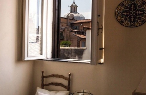 Rione VII Regola Apartment | Meisi House and the terrace above the rooftops of Campo dè Fiori