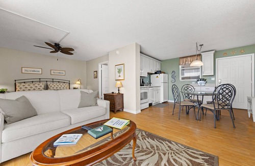 Bonita Springs Condo | Miles of beach right across the street. Enjoy ocean view from screened balcony!