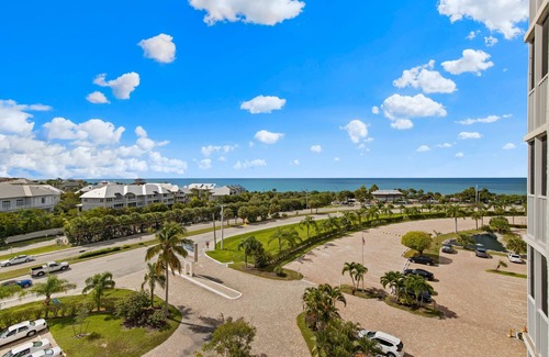 Bonita Springs Condo | Miles of beach right across the street. Enjoy ocean view from screened balcony!
