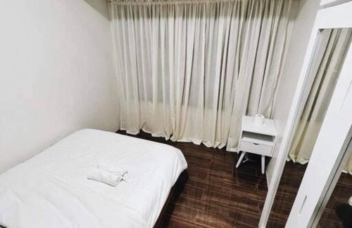 San Antonio Apartment | Minimalist 1 BR in Makati w/ Fast Wifi & Netflix