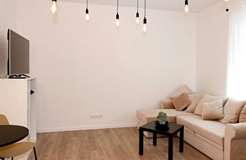 Old Town Apartment | Minimalist Studio Apartment in Old Town by Hostlovers