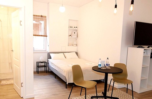 Old Town Apartment | Minimalist Studio Apartment in Old Town by Hostlovers