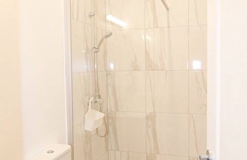 Old Town Apartment | Minimalist Studio Apartment in Old Town by Hostlovers