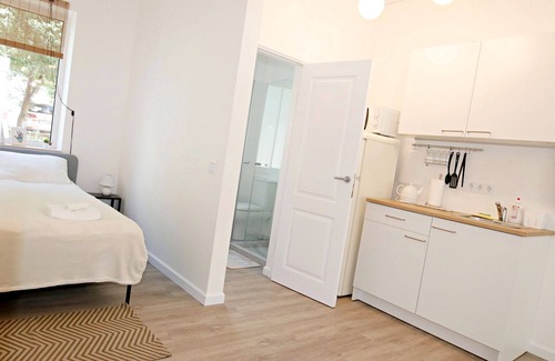 Old Town Apartment | Minimalist Studio Apartment in Old Town by Hostlovers